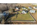 Aerial view of house and lot, showing backyard and neighborhood at 235 Goldenrod Cir, Salisbury, NC 28147