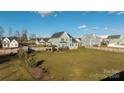 Large backyard with grassy area, shed, and privacy fence at 235 Goldenrod Cir, Salisbury, NC 28147