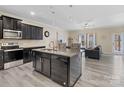 Spacious open-concept kitchen featuring a center island, stainless steel appliances, and modern finishes at 490 Melvista Ave, Rock Hill, SC 29732