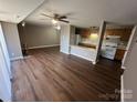 Open kitchen with light wood cabinets and white appliances at 9401 Old Concord Rd # K, Charlotte, NC 28213