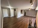 Open floorplan living room with laminate floors at 9401 Old Concord Rd # K, Charlotte, NC 28213