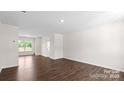 Spacious living room with hardwood floors and neutral walls at 1029 20Th Avenue Se Loop, Hickory, NC 28602