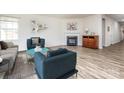 Living room features hardwood floors, fireplace and neutral colors at 242 White Apple Way, Statesville, NC 28625