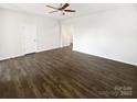 Spacious living room with hardwood floors and ceiling fan at 3922 Townes Blvd, Terrell, NC 28682