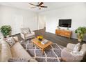 Virtually staged living room featuring a neutral color palette and modern furniture at 3922 Townes Blvd, Terrell, NC 28682