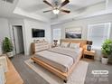 Virtually staged main bedroom with a neutral color scheme and king-size bed at 3922 Townes Blvd, Terrell, NC 28682