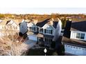 Two-story house aerial view, showcasing roofline and landscaping at 112 Artisan Ct, Mooresville, NC 28117