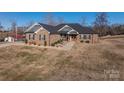 Brick house with gray accents and landscaping at 1370 Null Rd, Lincolnton, NC 28092