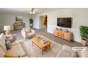 Bright living room with comfy seating and large TV at 801 Crestridge Rd, Statesville, NC 28677