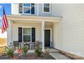Small front porch with two chairs and a small table at 11058 Argosy Dr, Lancaster, SC 29720