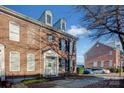 Townhome's brick facade and street view at 156 Singleton Rd, Mooresville, NC 28117