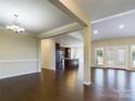 Spacious dining room with hardwood floors and kitchen view at 1903 46Th Avenue Ne Dr, Hickory, NC 28601