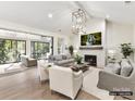 Bright living room with vaulted ceilings, fireplace, and large sliding doors to the outside at 5053 Townsend Rd, Lancaster, SC 29720