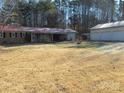 House with a red roof and a detached garage, large yard at 744 N Little Egypt Rd, Denver, NC 28037
