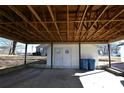 Open carport structure with wooden beams and a concrete floor at 9 N 11Th Ave, Maiden, NC 28650