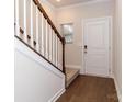 Entryway with staircase, hardwood floors, and a white door at 1334 31St St # 6, Conover, NC 28613