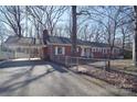 Brick ranch house with carport and fenced yard at 936 23Rd Ne Ave, Hickory, NC 28601