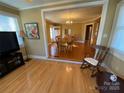 Open concept dining area with hardwood floors at 9915 Washam Potts Rd, Cornelius, NC 28031