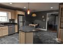 Updated kitchen with island and stainless steel appliances at 109 Shamrock Dr, Chester, SC 29706
