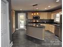 Updated kitchen with island and stainless steel appliances at 109 Shamrock Dr, Chester, SC 29706