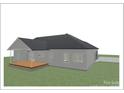 Rear view showcasing a deck and covered porch at 1569 E Ridge Rd, Salisbury, NC 28144