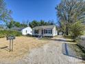 House with a gravel driveway and a spacious yard at 350 Orr Dr, Rock Hill, SC 29730