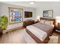 Virtually staged bedroom with a king-size bed and large window at 638 Chipley Ave # 6, Charlotte, NC 28205