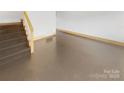 Modern stairs with dark stained wood and white railings at 638 Chipley Ave # 6, Charlotte, NC 28205