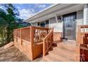Steps leading up to the front door with a wooden deck at 6514 Highwood Pl, Charlotte, NC 28210