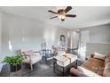 Spacious living room with hardwood floors and ceiling fan at 6514 Highwood Pl, Charlotte, NC 28210