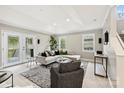 Cozy Gathering room with comfortable seating and access to a back deck at 741 Mcalway Rd, Charlotte, NC 28211