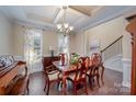 Formal dining room with hardwood floors and large wooden table with chairs at 79151 Ridgehaven Rd, Lancaster, SC 29720