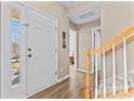 Bright entryway with hardwood floors and staircase at 1007 Rosewater Ln, Indian Trail, NC 28079