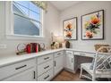 Bright and airy home office with built-in workspace and window at 4002 Grace Pointe Dr # 106, Indian Trail, NC 28079
