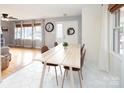 Dining area with light wood table and four chairs at 160 Northcrest Dr, Kannapolis, NC 28081