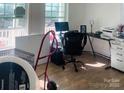 Bright office space with hardwood flooring, desk and lots of natural light, perfect for working from home at 640 Mckee St, Albemarle, NC 28001