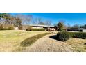 House with large yard, and detached garage at 947 Ravendale Dr, Charlotte, NC 28216
