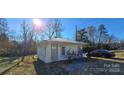 Charming cottage with freshly painted exterior and spacious yard at 153 Saluda St, Chester, SC 29706