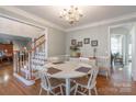 Bright dining room with a round table and chandelier at 117 Biscayne Ct, Mooresville, NC 28117