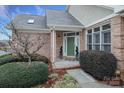 Inviting front entrance with green door and brick facade at 1575 Herlong Ct, Rock Hill, SC 29732