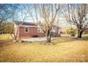 Brick ranch house with carport and spacious yard at 1750 Melrose Dr, Shelby, NC 28152