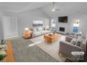 Spacious living room with fireplace and large windows at 2115 Windy Hill Ln, Monroe, NC 28110