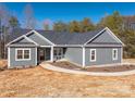 Gray house exterior with white trim, landscaping, and a curved walkway at 2572 Maiden-Salem Road Maiden Salem Rd # 4, Lincolnton, NC 28092