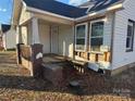 Front view of a small house needing renovation at 328 Whitner St, Rock Hill, SC 29730