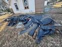 Construction debris in the yard of a house under renovation at 328 Whitner St, Rock Hill, SC 29730