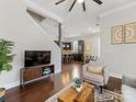 Open living area with hardwood floors and view into kitchen at 3551 Spencer St, Charlotte, NC 28205