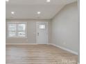 Bright living room features hardwood floors and recessed lighting at 3711 Indian Ct, Lenoir, NC 28601