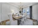 Elegant dining room featuring a chandelier and hardwood floors at 925 Gray Hook Dr, Fort Mill, SC 29708