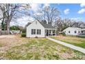 Front yard view of a charming white house at 621 Flint St, Rock Hill, SC 29730