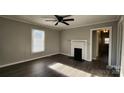 Living room with hardwood floors and a fireplace at 830 Richard Ave, Kannapolis, NC 28081